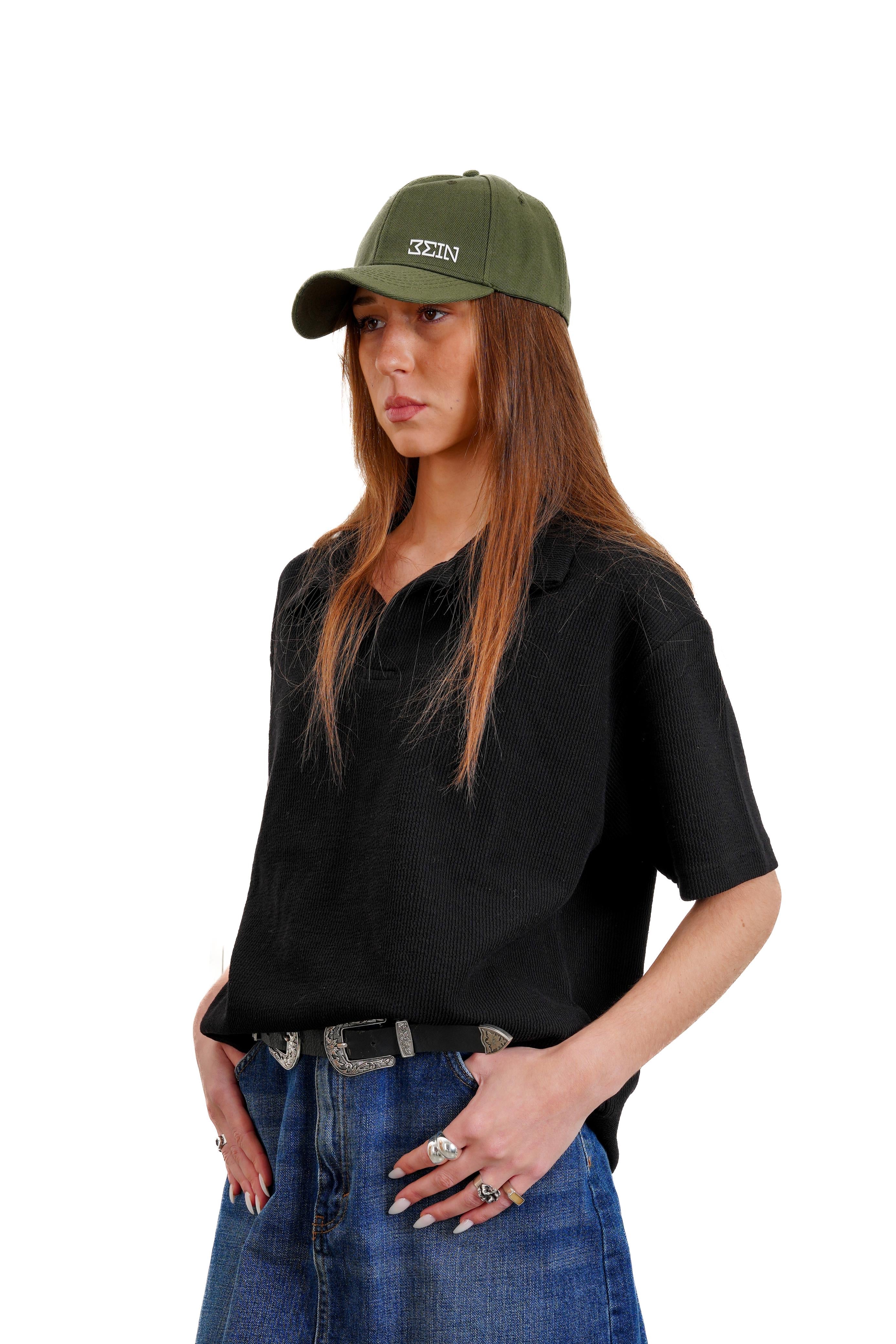 "Textured polo" in Black