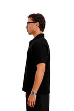 "Textured polo" in Black