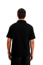 "Textured polo" in Black